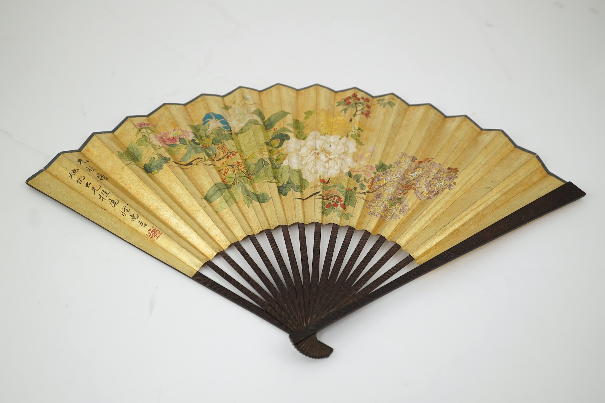 Two Chinese inscribed paper leaf fans, late 19th century
